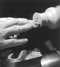 Turn a concave on the top of the ring holder