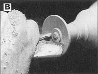 Begin hollowing the bell with the spindle gouge.