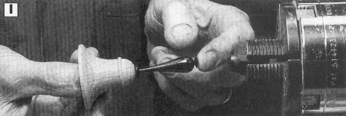 With five minute epoxy or cyanoacrylate (CA) glue, glue the handle into the bell.